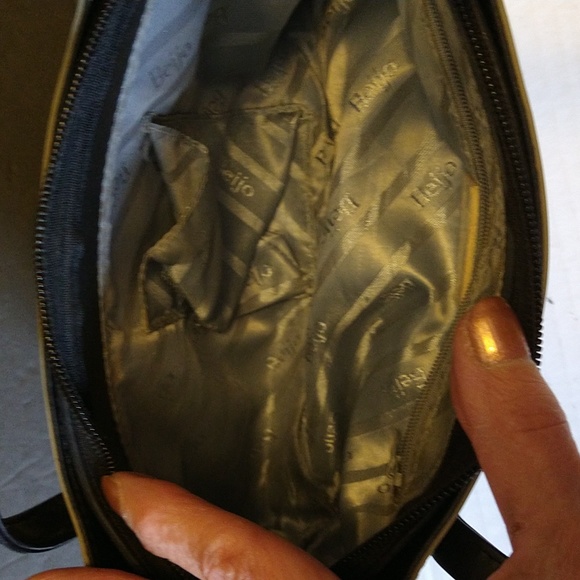 Beijo a pearlized gold color with black straps and trim. - Picture 14 of 14